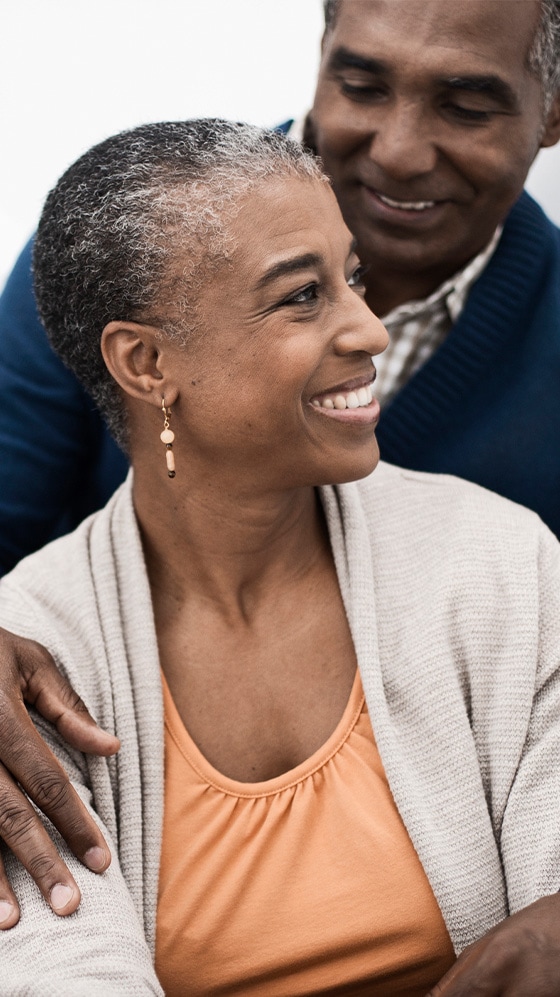 A couple smiling at each other