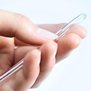 Someone holding a catheter
