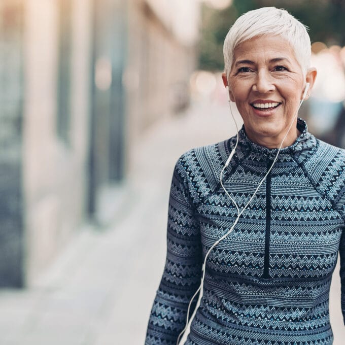 Portrait of a smiling senior sportswoman