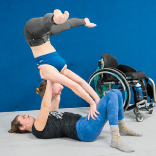 People doing AcroYoga